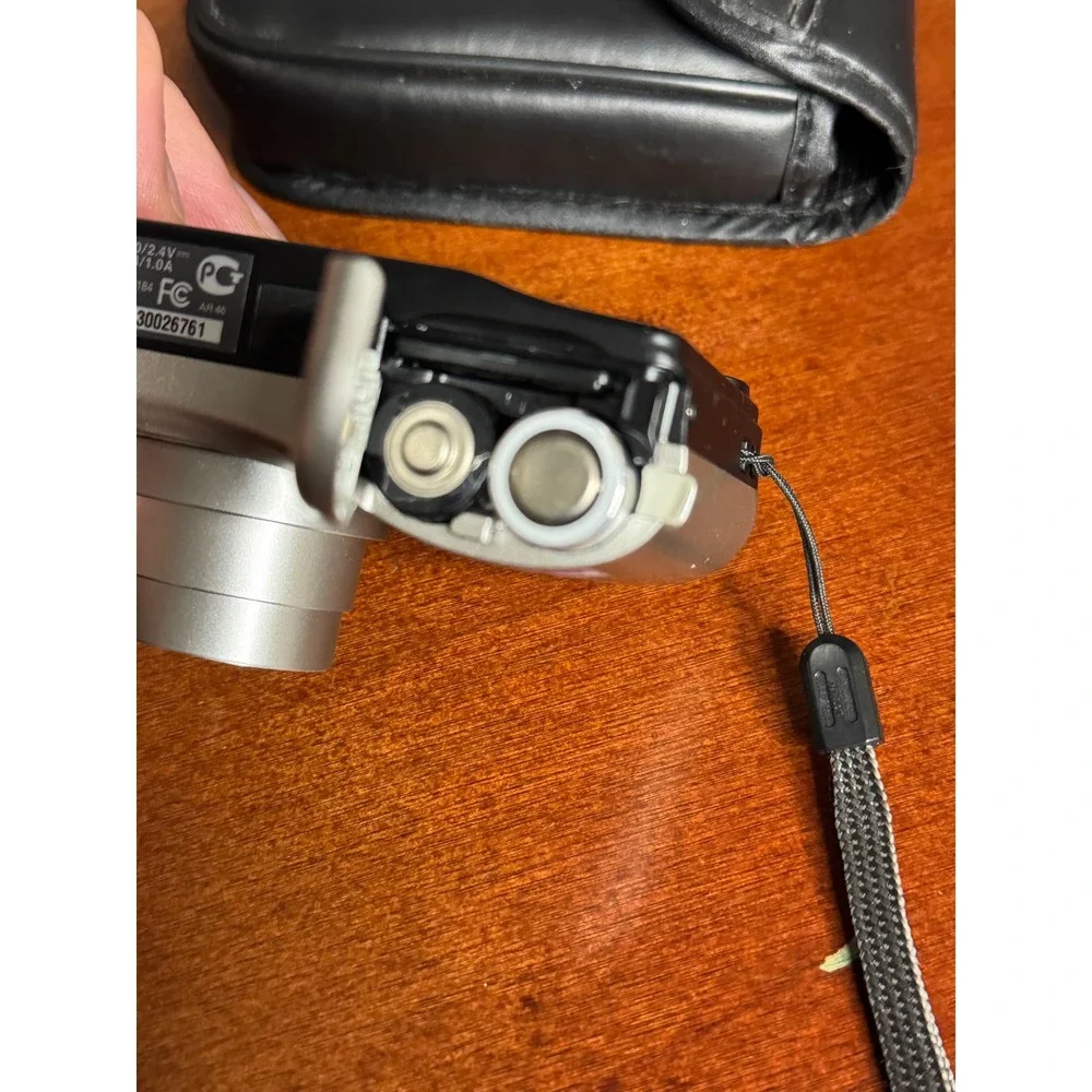 Nikon Coolpix L27 Silver 16.1MP Digital Camera 5x Zoom Bundle with 8GB SD Case